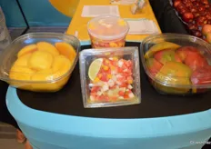 Mango cheeks (with or without skin) and mango salsa for foodservice on display at the booth of the National Mango Board.